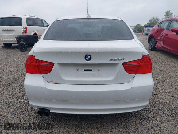 2010 BMW 3 Series 328i with VIN WBAPH7G59ANM52662, listed as a IAAI auction lot 42170338 with 163,648 mi miles and . Bid and sale history available at carsss.com. Image 16.