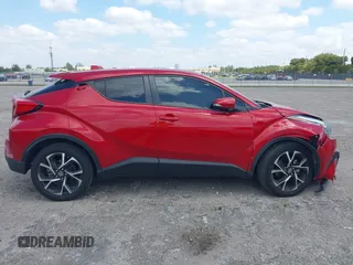 2022 Toyota C-HR XLE z VIN NMTKHMBX4NR141627, wystawiony jako IAAI lot #42108475 z przebiegiem 49 564 mil mil oraz . Historia ofert i sprzedaży dostępna na DreamBid. Obrazek 13.
