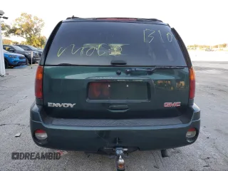2005 GMC Envoy SLT with VIN 1GKDS13S652329610, listed as a Copart auction lot 76384914 with Not Provided miles and Salvage Title. Bid and sale history available at DreamBid. Image 6.