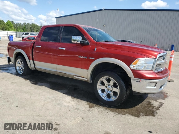 2009 Dodge 1500 SLT with VIN 1D3HV13T79J524695, listed as a Copart auction lot 54044725 with 233,668 mi miles and Salvage title. Bid and sale history available at DreamBid. Image 4.