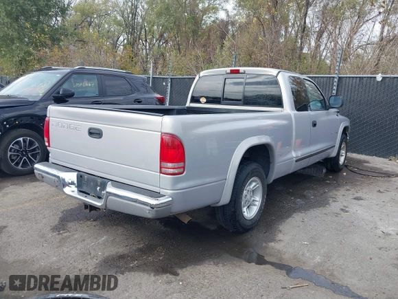 1998 Dodge Dakota SLT with VIN 1B7GL22Y5WS736756, listed as a IAAI auction lot 40687209 with 141,560 mi miles. Bid and sale history available at carsss.com. Image 4.