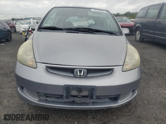 2007 Honda Fit with VIN JHMGD38417S025157, listed as a Copart auction lot 72768984 with 128,944 mi miles and Clean Title. Bid and sale history available at carsss.com. Image 5.
