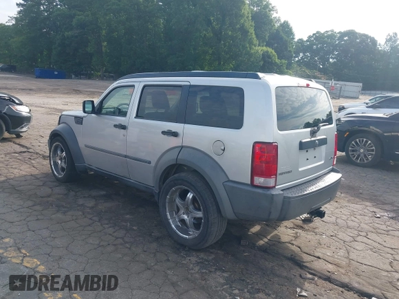 2007 Dodge Nitro SXT with VIN 1D8GU28K37W562598, listed as a IAAI auction lot 42491176 with 202,676 mi miles and . Bid and sale history available at DreamBid. Image 3.