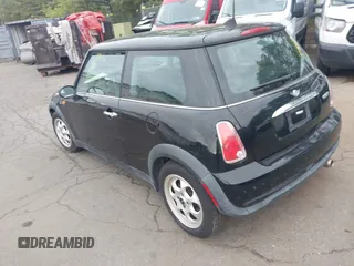 2005 MINI Hardtop with VIN WMWRC33535TJ70850, listed as a IAAI auction lot 42219720 with 66,398 mi miles and . Bid and sale history available at DreamBid. Image 3.