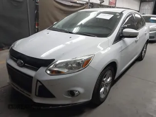 2014 Ford Focus SE with VIN 1FADP3F22EL437727, listed as a IAAI auction lot 42001593 with 90,814 mi miles. Bid and sale history available at carsss.com. Image 2.