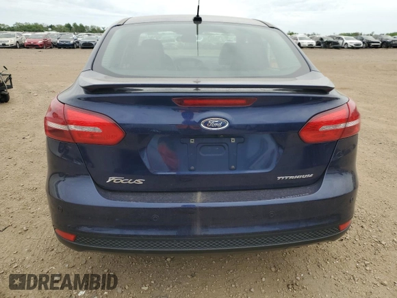 2017 Ford Focus Titanium with VIN 1FADP3J27HL298402, listed as a Copart auction lot 57340875 with 110,172 mi miles and Salvage title. Bid and sale history available at DreamBid. Image 6.