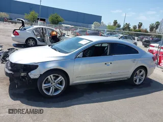 2014 Volkswagen CC R-Line with VIN WVWBP7AN0EE527649, listed as a IAAI auction lot 42009588 with 122,964 mi miles. Bid and sale history available at carsss.com. Image 15.