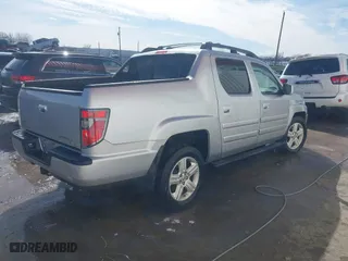 2014 Honda Ridgeline RTL with VIN 5FPYK1F51EB012843, listed as a IAAI auction lot 41629002 with 114,761 mi miles. Bid and sale history available at carsss.com. Image 4.