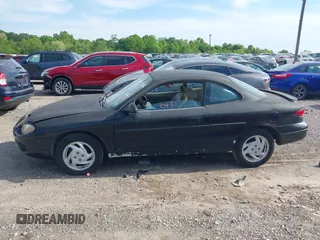 2000 Ford Escort ZX2 z VIN 3FAKP1139YR235632, wystawiony jako IAAI lot #42240451 z przebiegiem 139 532 mil mil oraz . Historia ofert i sprzedaży dostępna na DreamBid. Obrazek 14.