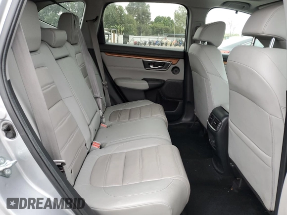 2020 Honda CR-V Touring z VIN 7FARW1H96LE006653, wystawiony jako Copart lot #57167475 z przebiegiem 49 286 mil mil oraz Szkoda całkowita • Salvage title. Historia ofert i sprzedaży dostępna na DreamBid. Obrazek 11.