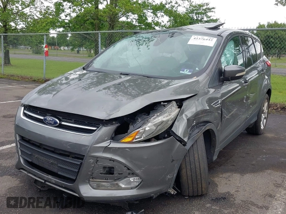 2013 Ford Escape SEL z VIN 1FMCU9H96DUC66206, wystawiony jako IAAI lot #42376442 z przebiegiem 96 776 mil mil oraz . Historia ofert i sprzedaży dostępna na DreamBid. Obrazek 17.