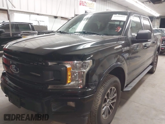 2019 Ford F-150 XL with VIN 1FTEW1E44KKD27658, listed as a IAAI auction lot 41916952 with 82,428 mi miles and . Bid and sale history available at DreamBid. Image 2.