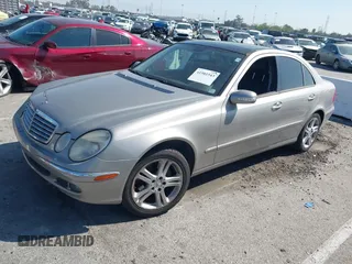 2006 Mercedes-Benz E-Class 3.5L with VIN WDBUF56J96A838185, listed as a IAAI auction lot 41981543 with 213,431 mi miles. Bid and sale history available at carsss.com. Image 2.