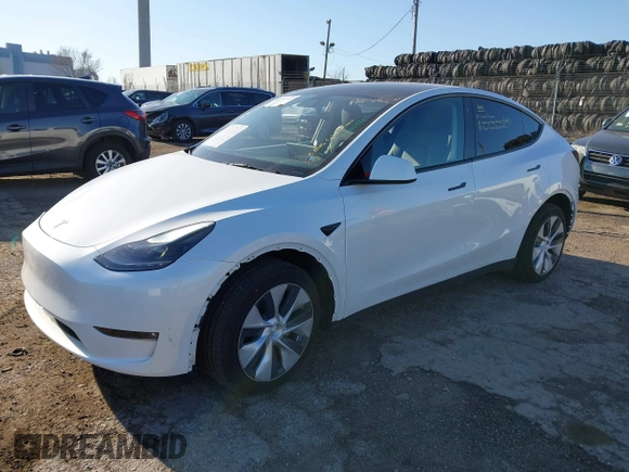 2023 Tesla Model Y Long Range z VIN 7SAYGDEE5PF765326, wystawiony jako IAAI lot #41757113 z przebiegiem 10 461 mil mil oraz . Historia ofert i sprzedaży dostępna na DreamBid. Obrazek 2.