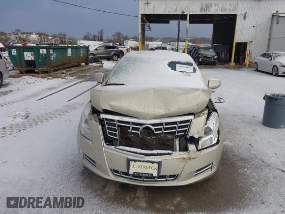 2014 Cadillac XTS Luxury z VIN 2G61M5S37E9304598, wystawiony jako IAAI lot #41006051 z przebiegiem 115 879 mil mil oraz . Historia ofert i sprzedaży dostępna na DreamBid. Obrazek 12.