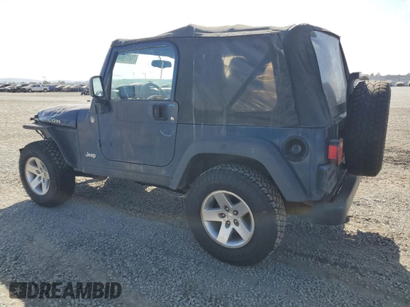 2005 Jeep Wrangler Rubicon with VIN 1J4FA69S05P351725, listed as a Copart auction lot 71411904 with 144,557 mi miles and Salvage Title. Bid and sale history available at carsss.com. Image 2.
