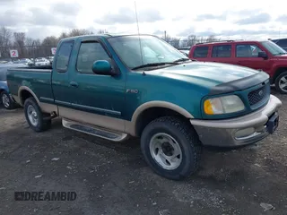 1997 Ford F-150 XL with VIN 1FTDX18WXVNB82554, listed as a IAAI auction lot 41821547 with 236,735 mi miles. Bid and sale history available at carsss.com. Image 1.