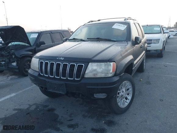 2002 Jeep Grand Cherokee Limited with VIN 1J8GW58NX2C327798, listed as a IAAI auction lot 42082634 with 167,863 mi miles. Bid and sale history available at carsss.com. Image 2.