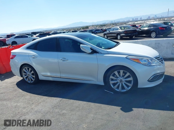 2017 Hyundai Azera Limited z VIN KMHFH4JG9HA579125, wystawiony jako IAAI lot #41718120 z przebiegiem 51 005 mil mil oraz . Historia ofert i sprzedaży dostępna na DreamBid. Obrazek 13.