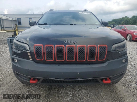 2019 Jeep Cherokee Trailhawk with VIN 1C4PJMBX9KD183116, listed as a Copart auction lot 58518265 with 124,258 mi miles and Salvage title. Bid and sale history available at DreamBid. Image 5.