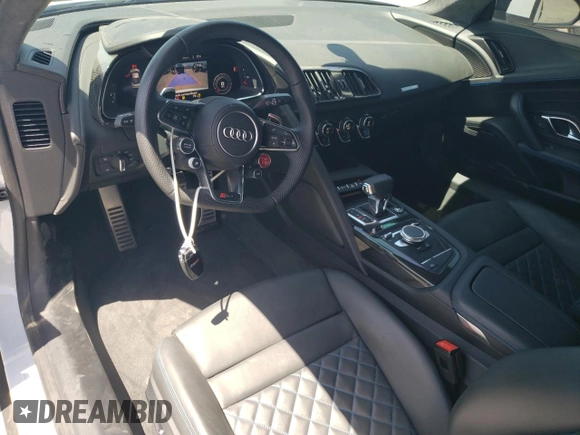 2023 Audi R8 performance quattro z VIN WUACEAFX9P7900103, wystawiony jako Copart lot #57456835 z przebiegiem 5 220 mil mil oraz Szkoda całkowita • Salvage title. Historia ofert i sprzedaży dostępna na DreamBid. Obrazek 8.