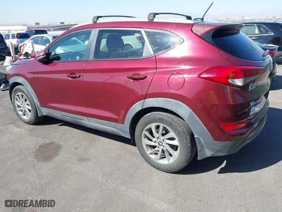 2016 Hyundai Tucson Limited with VIN KM8J33A26GU063454, listed as a IAAI auction lot 41975782 with 74,519 mi miles. Bid and sale history available at carsss.com. Image 3.