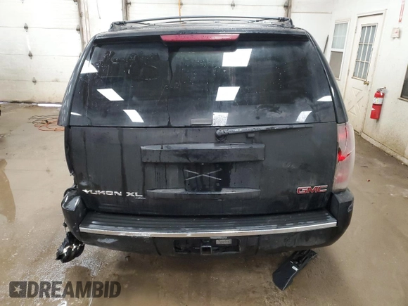 2012 GMC Yukon Denali with VIN 1GKS1EEFXCR126256, listed as a Copart auction lot 88656765 with 203,007 mi miles and Clean Title. Bid and sale history available at carsss.com. Image 6.