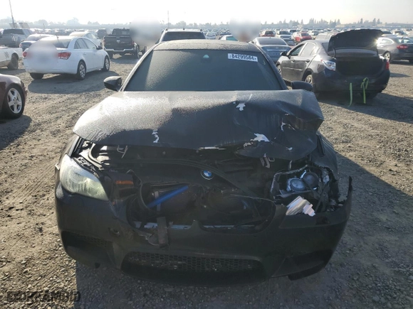 2013 BMW M5 with VIN WBSFV9C58DD096250, listed as a Copart auction lot 84299584 with 87,739 mi miles and Salvage Title. Bid and sale history available at carsss.com. Image 5.