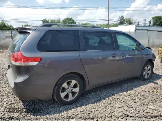 2012 Toyota Sienna XLE AAS with VIN 5TDYK3DC3CS237344, listed as a Copart auction lot 63271815 with 105,860 mi miles and Salvage title. Bid and sale history available at DreamBid. Image 3.