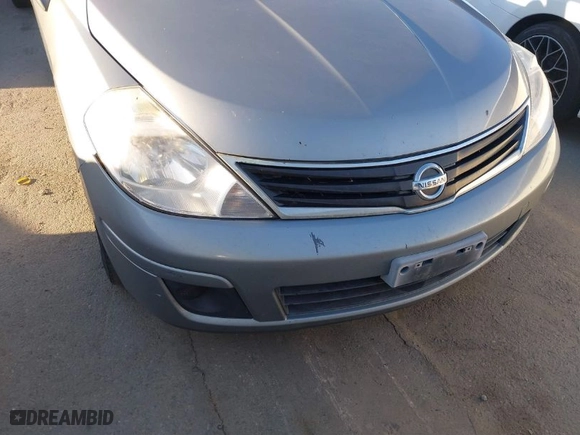 2010 Nissan Versa 1.8 S with VIN 3N1BC1CP1AL429587, listed as a IAAI auction lot 41604671 with 174,723 mi miles. Bid and sale history available at carsss.com. Image 6.