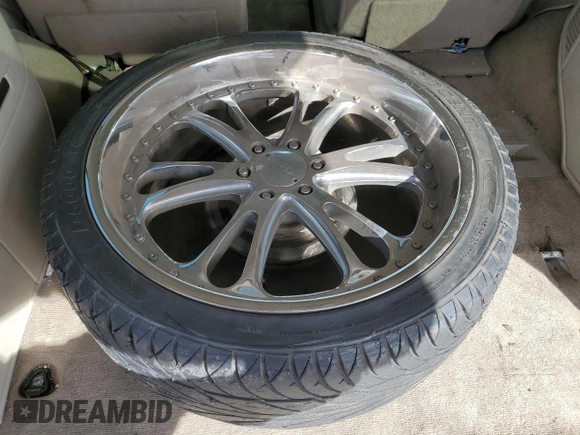 2004 Cadillac Escalade z VIN 1GYEC63T44R185526, wystawiony jako Copart lot #50969335 z przebiegiem 129 386 mil mil oraz Szkoda całkowita • Salvage title. Historia ofert i sprzedaży dostępna na DreamBid. Obrazek 13.