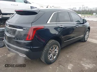 2021 Cadillac XT5 AWD Premium Luxury with VIN 1GYKNDRS6MZ147571, listed as a IAAI auction lot 41864286 with 46,144 mi miles. Bid and sale history available at carsss.com. Image 4.