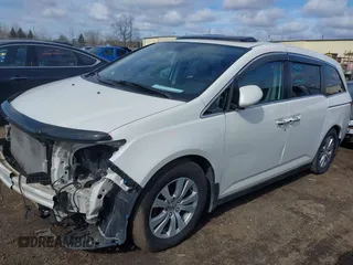 2014 Honda Odyssey EX-L with VIN 5FNRL5H63EB136541, listed as a IAAI auction lot 41866320 with 148,696 mi miles and . Bid and sale history available at DreamBid. Image 2.