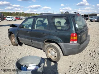2003 Ford Escape XLS Popular with VIN 1FMYU92173KD49159, listed as a Copart auction lot 75314914 with 0 mi miles and Salvage Title. Bid and sale history available at carsss.com. Image 2.