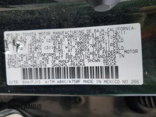 2012 Toyota Tacoma z VIN 3TMLU4ENXCM082978, wystawiony jako Copart lot #60069475 z przebiegiem 169 533 mil mil oraz Szkoda całkowita • Salvage title. Historia ofert i sprzedaży dostępna na DreamBid. Obrazek 13.