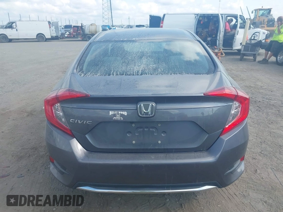 2020 Honda Civic LX with VIN 2HGFC2F65LH505932, listed as a IAAI auction lot 40046863 with 59,768 mi miles and . Bid and sale history available at DreamBid. Image 17.