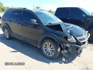 2014 Dodge Journey SXT with VIN 3C4PDCBG5ET250732, listed as a IAAI auction lot 41900940 with 144,301 mi miles. Bid and sale history available at carsss.com. Image 1.