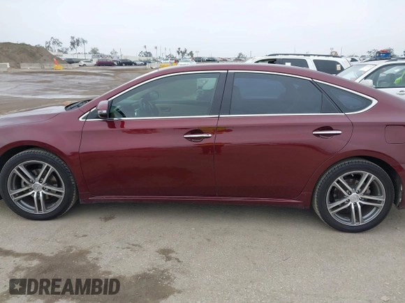 2013 Toyota Avalon XLE with VIN 4T1BK1EB1DU001297, listed as a IAAI auction lot 42041699 with 217,190 mi miles and . Bid and sale history available at DreamBid. Image 14.