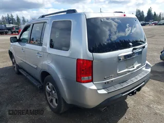 2013 Honda Pilot EX-L with VIN 5FNYF4H71DB041562, listed as a IAAI auction lot 41819184 with 136,014 mi miles and . Bid and sale history available at DreamBid. Image 3.