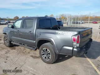 2023 Toyota Tacoma 4WD SR with VIN 3TMCZ5AN8PM574766, listed as a IAAI auction lot 40663003 with 43,978 mi miles. Bid and sale history available at carsss.com. Image 3.
