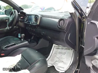 2020 Toyota Tacoma 2WD SR5 with VIN 3TMAZ5CN7LM129496, listed as a IAAI auction lot 39945333 with 140,154 mi miles. Bid and sale history available at carsss.com. Image 5.