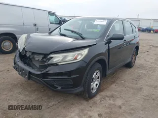 2015 Honda CR-V LX with VIN 2HKRM3H35FH501019, listed as a IAAI auction lot 41014683 with 111,168 mi miles and . Bid and sale history available at carsss.com. Image 17.