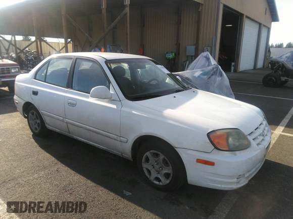 2004 Hyundai Accent GL with VIN KMHCG45C04U498939, listed as a IAAI auction lot 41384821 with 247,994 mi miles. Bid and sale history available at carsss.com. Image 1.