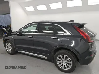 2023 Cadillac XT4 AWD Premium Luxury z VIN 1GYFZDR42PF174473, wystawiony jako Copart lot #55953305 z przebiegiem 42 268 mil mil oraz Szkoda całkowita • Salvage title. Historia ofert i sprzedaży dostępna na DreamBid. Obrazek 2.
