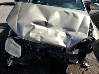 2009 Kia Spectra LX z VIN KNAFE222995667202, wystawiony jako Copart lot #49860315 z przebiegiem 158 498 mil mil oraz Szkoda całkowita • Salvage title. Historia ofert i sprzedaży dostępna na DreamBid. Obrazek 13.