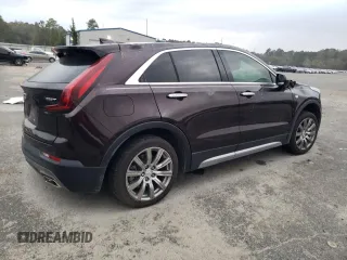 2020 Cadillac XT4 FWD Premium Luxury with VIN 1GYFZCR42LF149030, listed as a Copart auction lot 82671894 with 88,570 mi miles and Salvage Title. Bid and sale history available at carsss.com. Image 3.