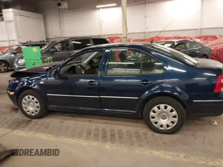 2004 Volkswagen Jetta GL с VIN 3VWRK69M94M113701, выставлен на аукционе IAAI как лот 41573481 с пробегом 190 711 миль миль и . История ставок и продаж доступна на DreamBid. Изображение 14.