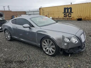 2012 Bentley Continental GT with VIN SCBFR7ZA5CC074511, listed as a Copart auction lot 45402025 with 51,261 mi miles and Salvage Title. Bid and sale history available at DreamBid. Image 4.