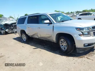 2017 Chevrolet Suburban LT z VIN 1GNSKHKC9HR268651, wystawiony jako IAAI lot #42125406 z przebiegiem 174 451 mil mil oraz . Historia ofert i sprzedaży dostępna na DreamBid. Obrazek 13.