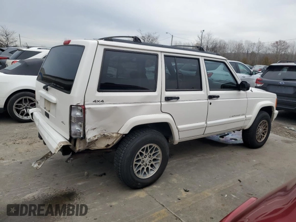 1997 Jeep Cherokee Country with VIN 1J4FJ78S9VL576899, listed as a Copart auction lot 82303584 with 335,746 mi miles and Salvage Title. Bid and sale history available at carsss.com. Image 3.